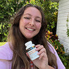 The profile avatar of a customer who reviewed the product named Maria T.