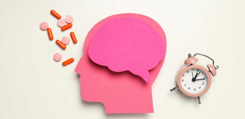 A pink head silhouette with a speech bubble, supplements, and an alarm clock on a white background.
