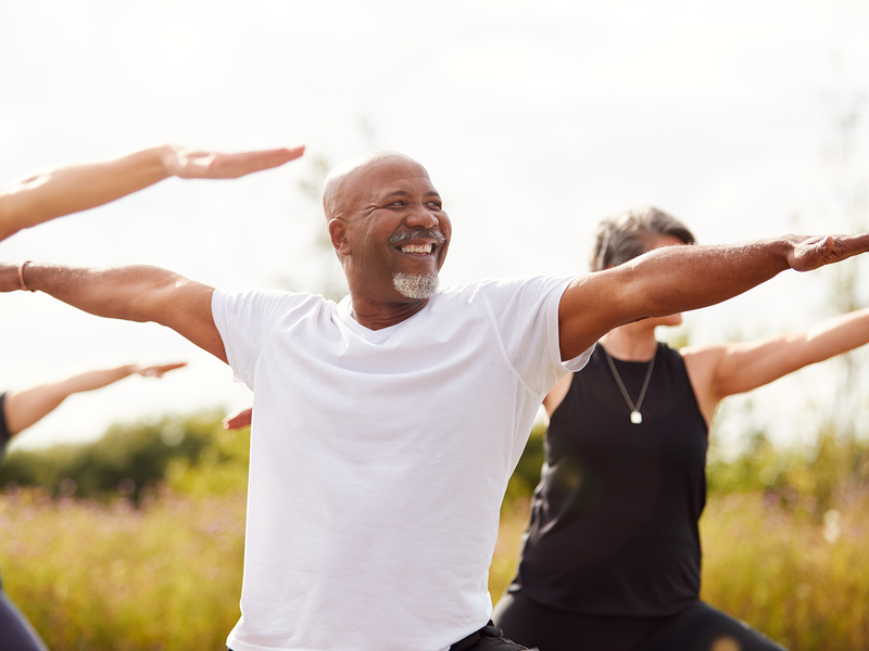 Some elderly people doing exercise.