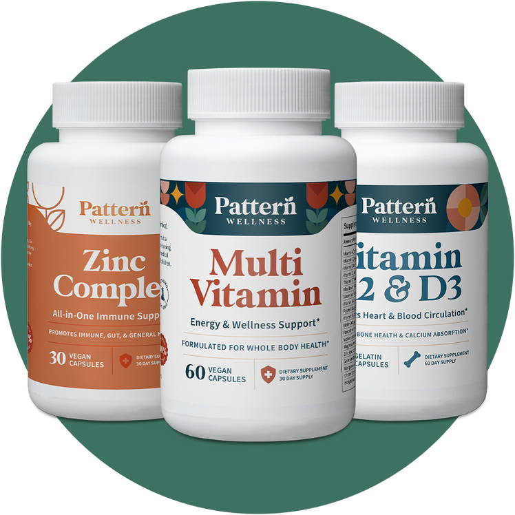 Bottles of Daily Multivitamin, Vitamin K2 & D3, and Zinc Complex.